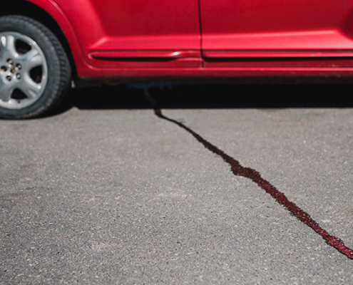 How to Remove Oil Stains from an Asphalt Driveway