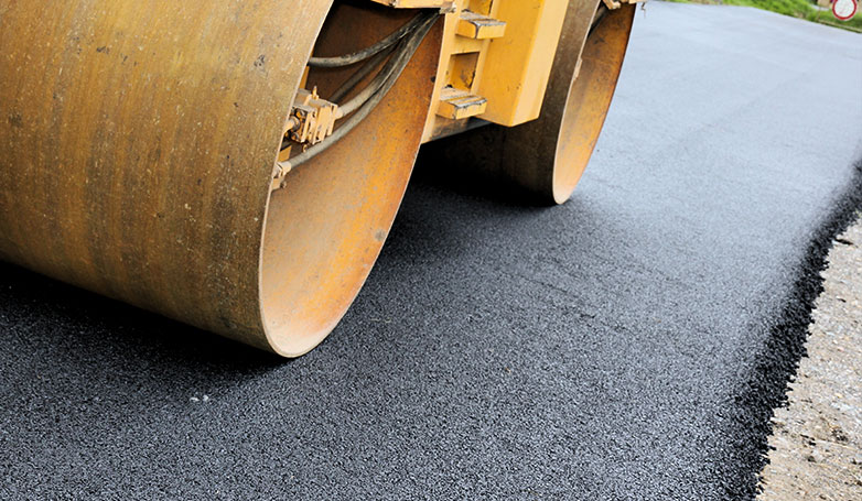 rolling new asphalt surface