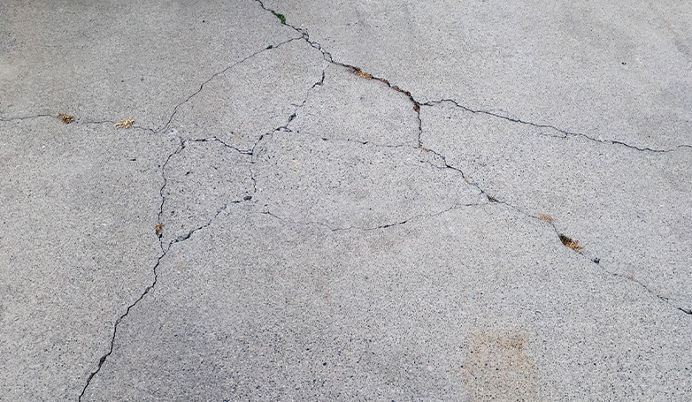 Signs your asphalt driveway needs repairs