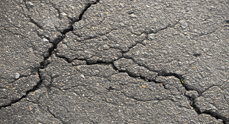 How To Repair Cracks in Asphalt Driveway