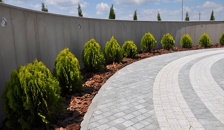 A beautiful permeable driveway with plants