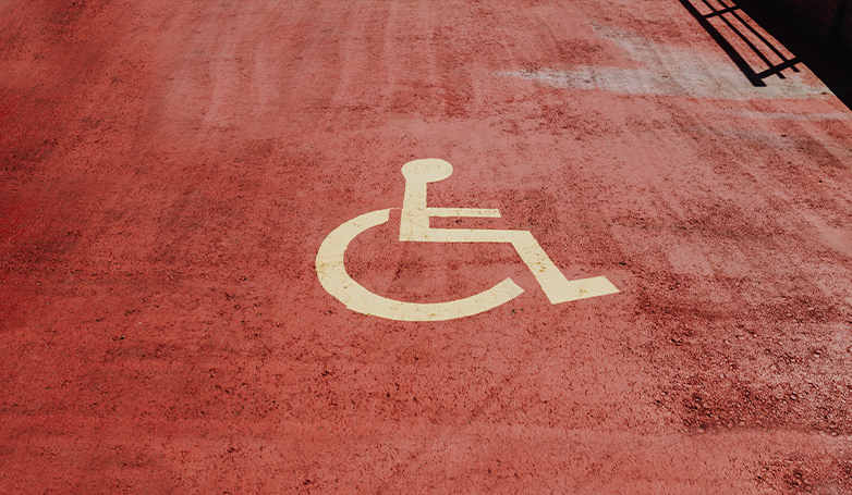 Parking lot with persons with disabilities area.