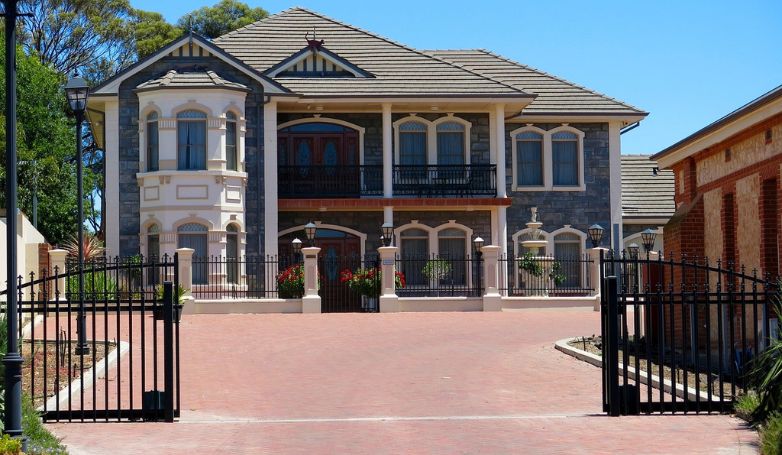 Beautiful house with black cantilever gates