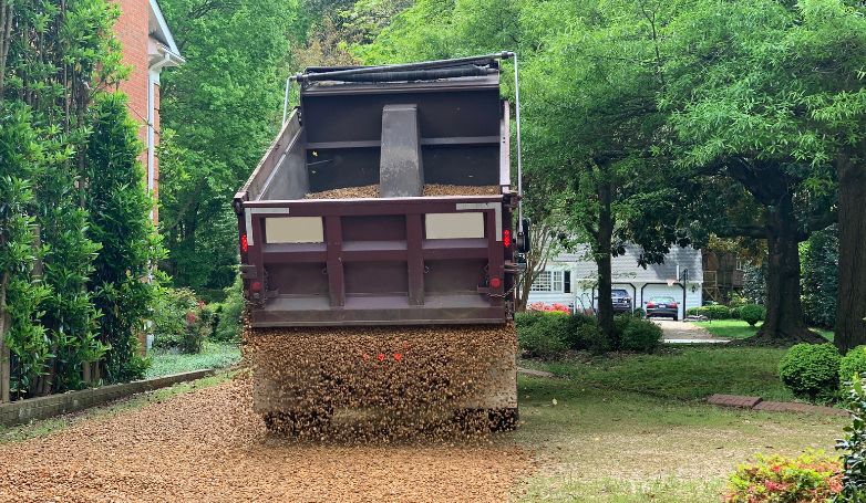The company just dumped gravel on one of its customer's driveways