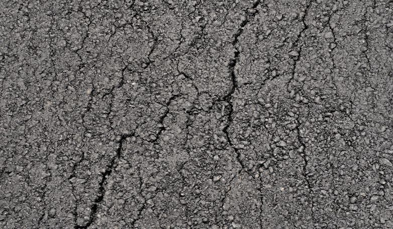 Some cracks in the asphalt were spotted by the road owner