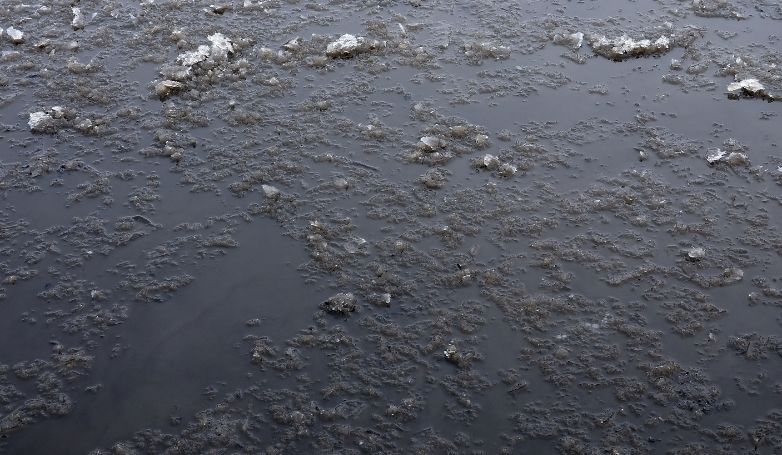 An asphalt ruined by ice and low temperatures
