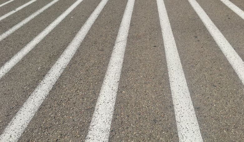 Example of natural paint used to paint parking stripes for cars