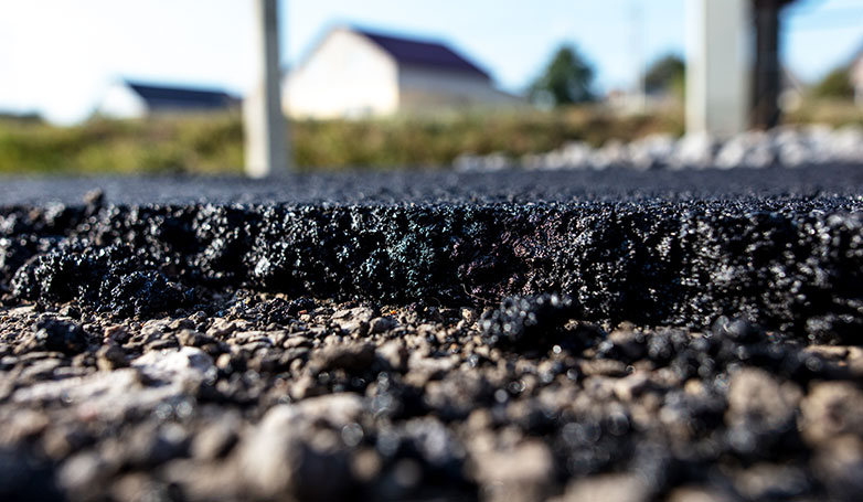 The freshly laid asphalt is curing