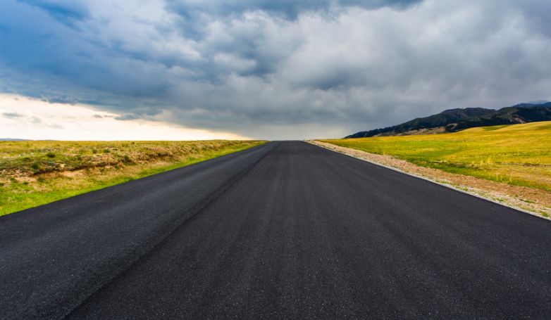 A road made of asphalt constructed with environmentally friendly materials.